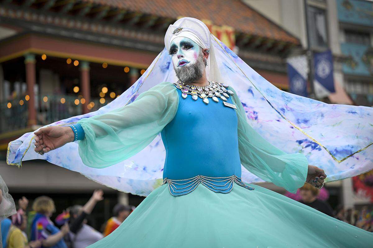 Ethyl Lynn Torch of the City of Fountains Sisters, danced in the KC Pride Parade in 2023. Floats, performers and community groups participated in the parade which celebrates the LGBTQ+ community.