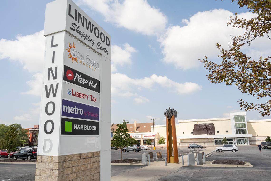 Sun Fresh Linwood with a black tarp covering its logo on Wednesday, Aug. 13, 2025, in Kansas City. The troubled grocery store closed the previous day.