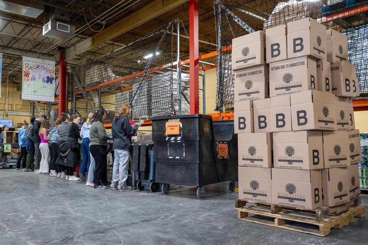Volunteers were on hand to pack BackSnacks at Harvesters on the MLK Day of Service on Monday, Jan. 20, 2025, at Harvesters in Kansas City. The BackSnacks program provides food for elementary and some middles school students to take home over the weekend.