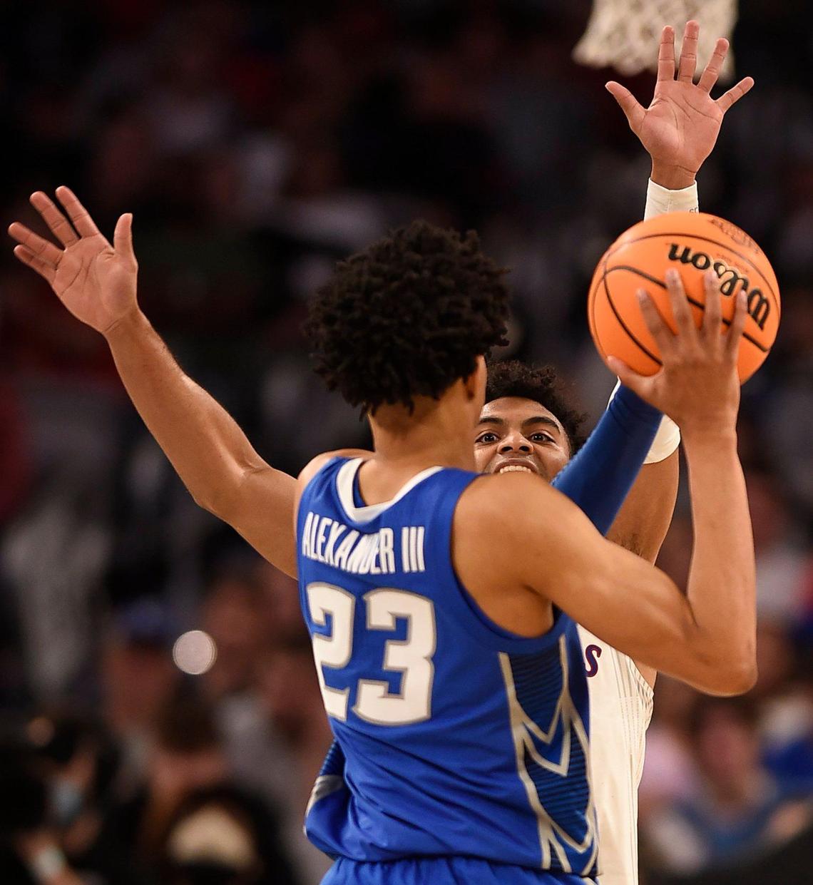KU’s Remy Martin defends Creighton’s Trey Alexander during the second half of the Jayhawks’ 79-72 win over the Bluejays in a second-round NCAA Tournament game Saturday in Fort Worth, Texas.