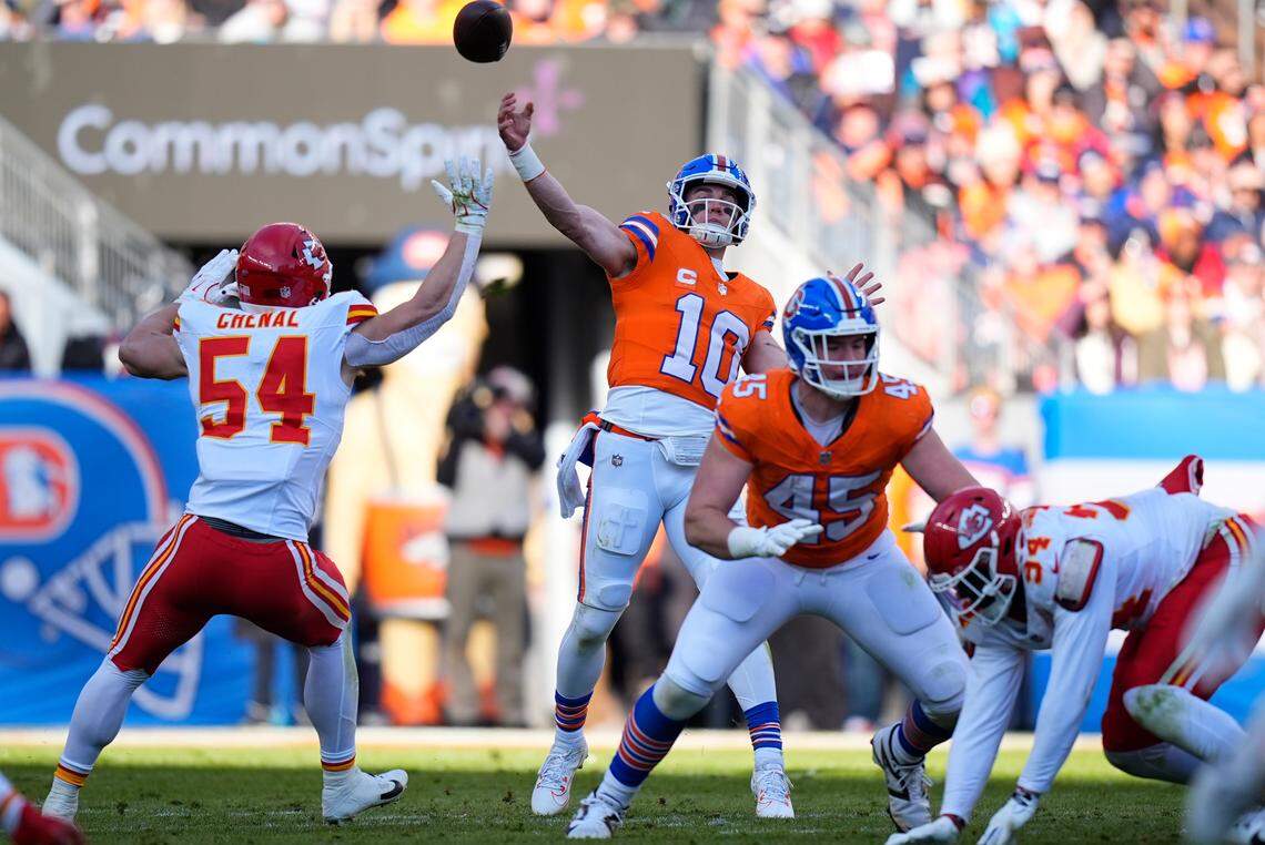 Broncos quarterback Bo Nix lofts a pass during the Kansas City Chiefs’ NFL Week 18 game at Empower Field at Mile High in Denver on Sunday, Jan. 5, 2025.