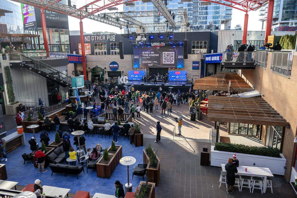 People attend the FIFA World Cup draw watch party at the Power & Light District on Friday, Dec. 5, 2025, in Kansas City.