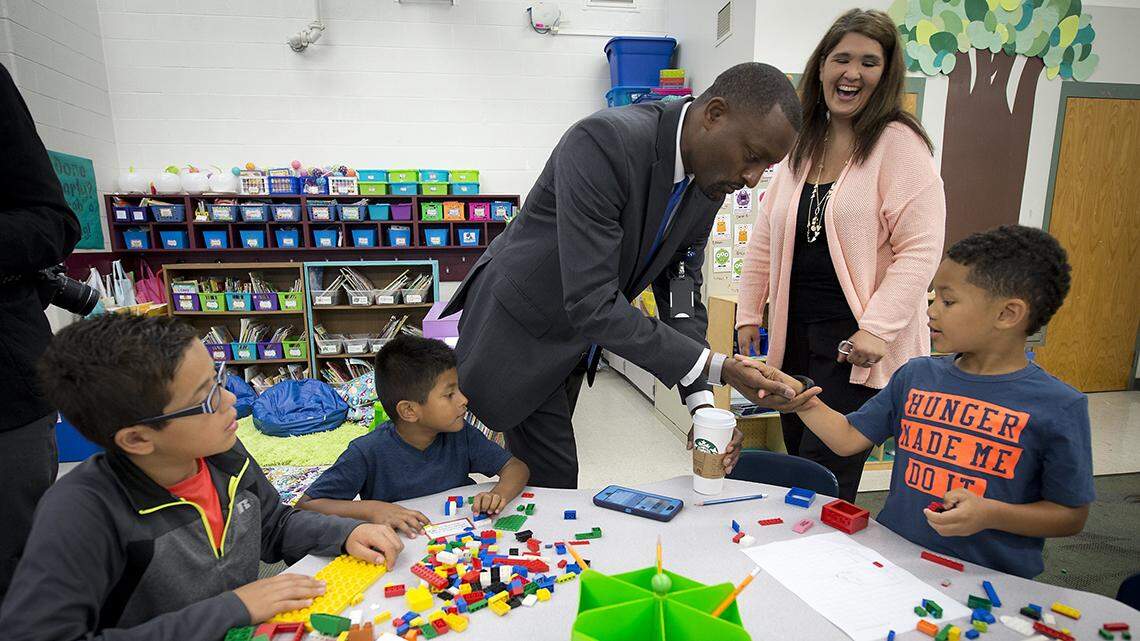 Former Kansas City Public Schools superintendent Mark Bedell visits a classroom in 2016. Bedell left the district in August. KCPS, which is 54% Black, is one of the districts in Missouri that does teach some critical race theory.