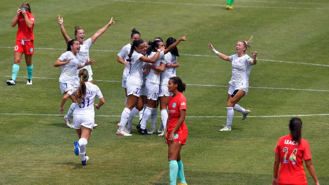 After scoring a goal from mid field, Orlando’s Marta got mobbed by her teammates and Kansas City NWSL could only look on in anguish during the second period of Wednesday’s game at Legends Field. The goal put Orlando up, 3-1.