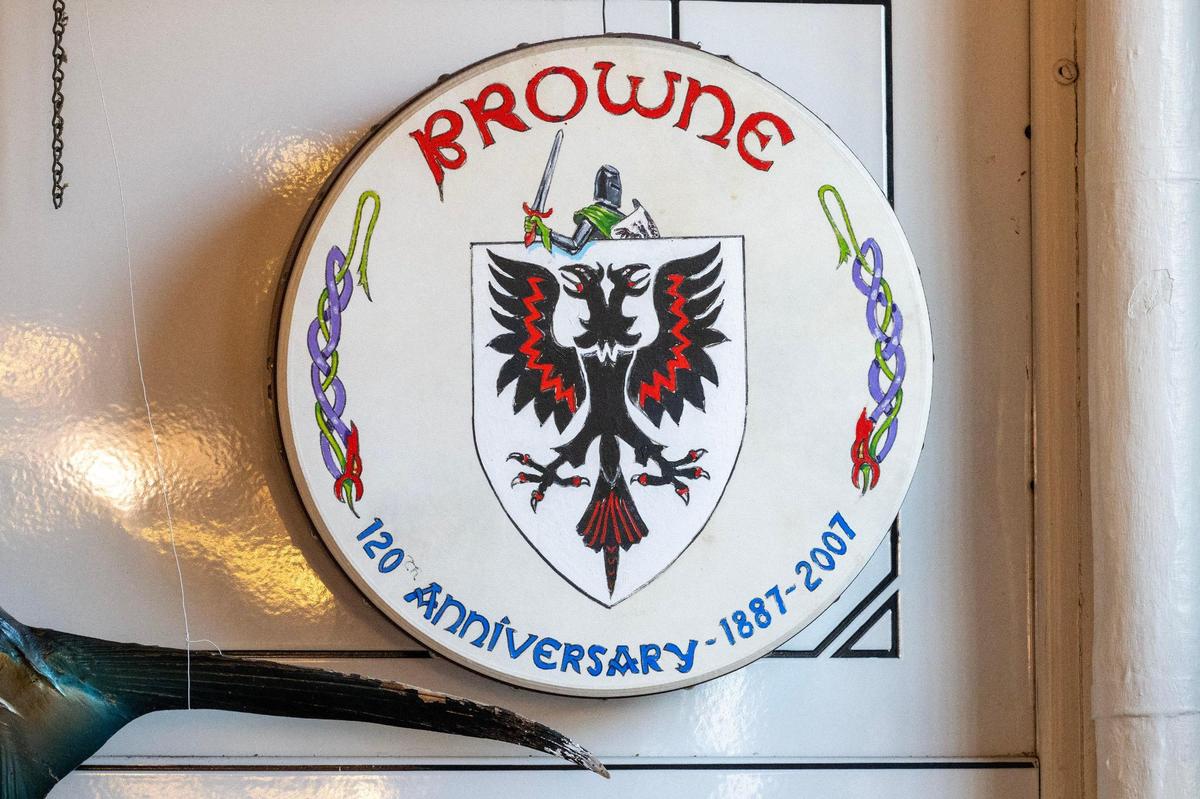 A 120th anniversary coat of arms is displayed at Browne’s Irish Marketplace.
