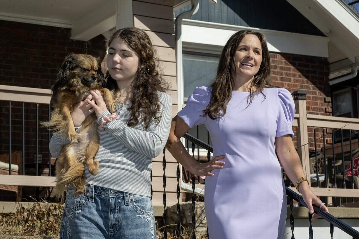 Jamie Burks, a realtor, and her daughter, Halle Burks, 13, with their dog, Molly, will be earning extra cash during the 2026 FIFA World Cup by renting out their West Plaza area home as a short-term rental. 