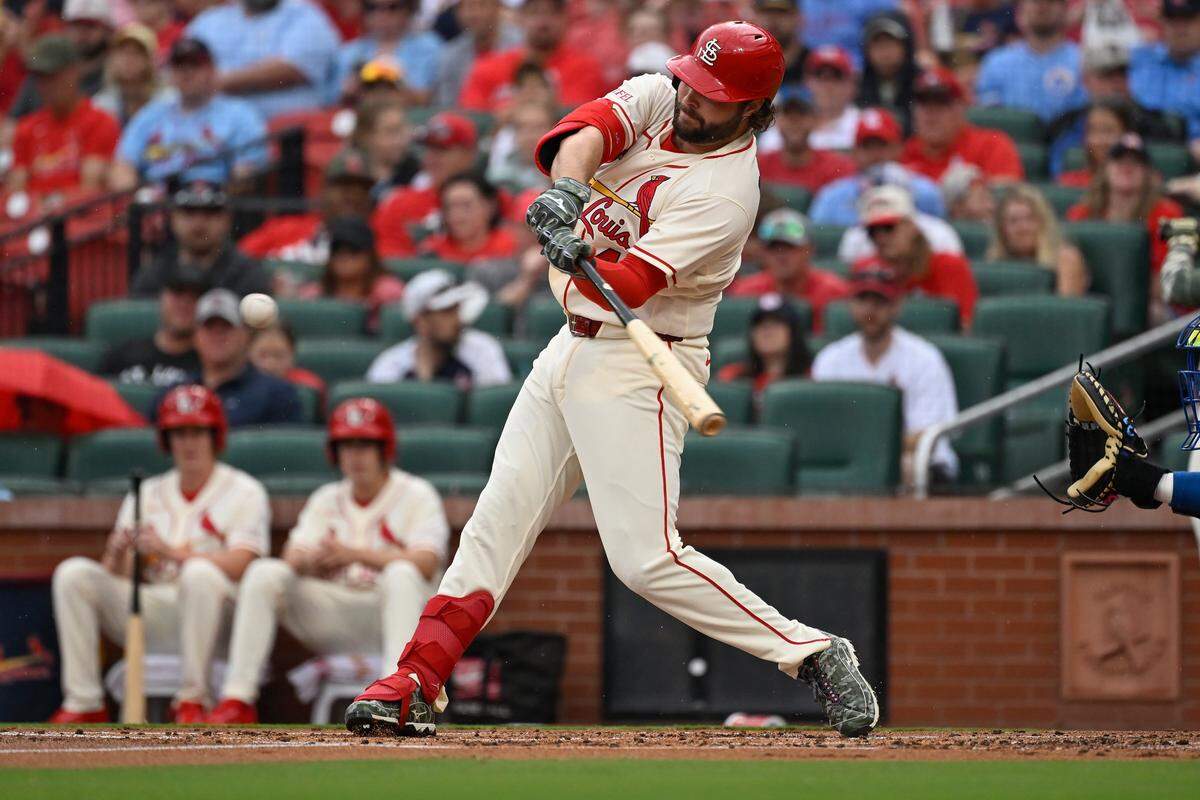 Cardinals first baseman Alec Burleson hits a sacrifice fly against the Royals during the first inning of a game at Busch Stadium in St. Louis on Saturday, May 16, 2026.