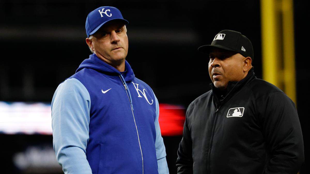 Kansas City Royals manager Matt Quatraro (33) talks to umpire Adrian Johnson in the eighth inning against the Detroit Tigers at Comerica Park on April 17, 2025.