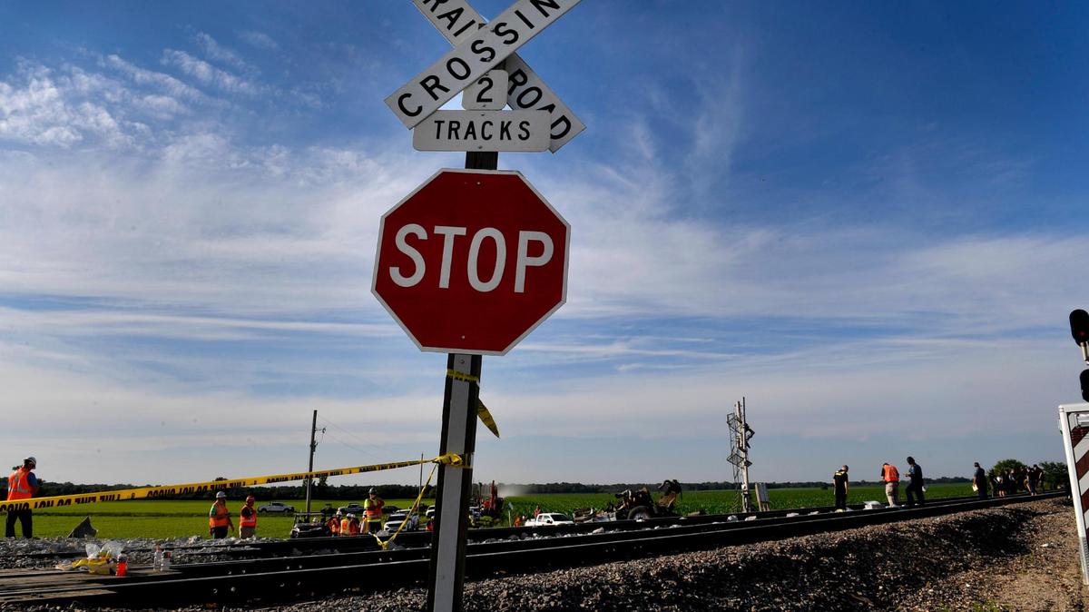 Several cars of an Amtrak train traveling from Los Angeles to Chicago derailed Monday afternoon after it struck a dump truck at a crossing in northern Missouri, Amtrak announced. More than 200 people were on board the train at the time of the crash, which was first reported about 12:43 p.m. near Mendon, Missouri, according to the Missouri State Highway Patrol. Three people were killed in the crash, the patrol said, including two people on the train and one person in the dump truck. This picture is looking east from the intersection.