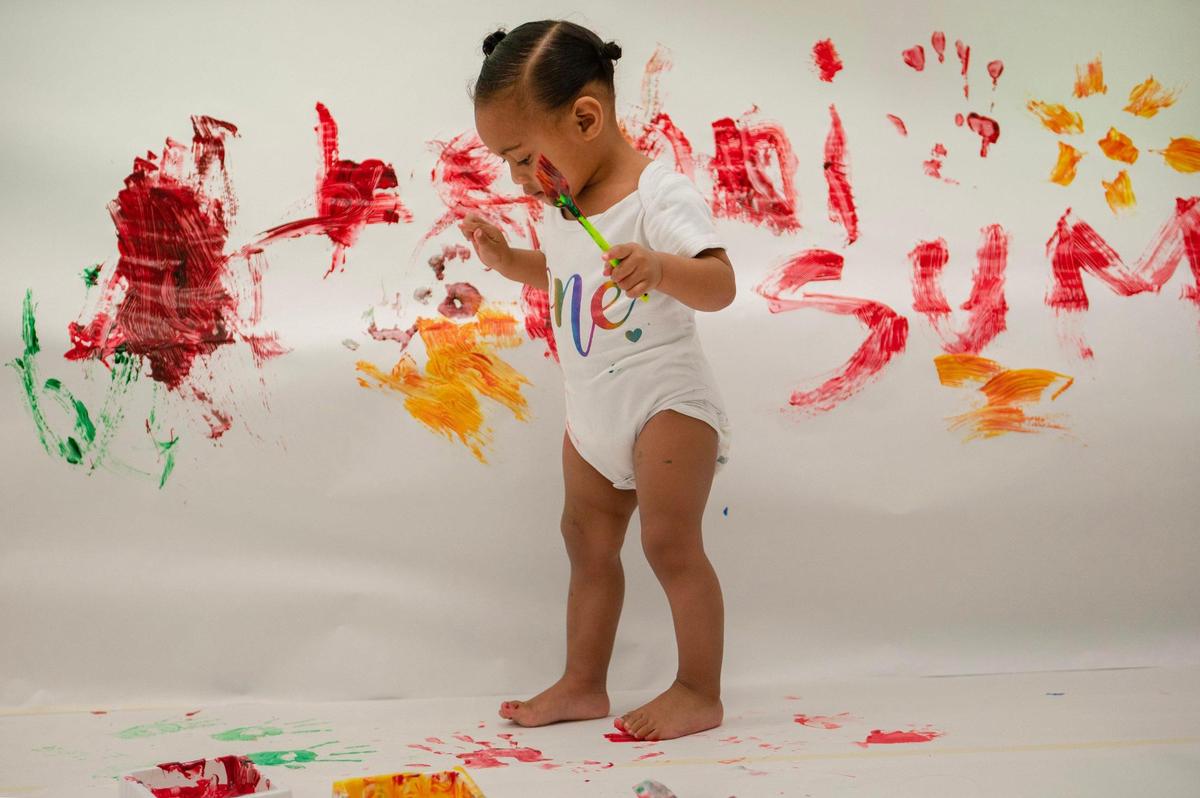 Leilani eventually got used to the feel of the paint and went on to produce this masterpiece with help from her father Xzavier Moananu.