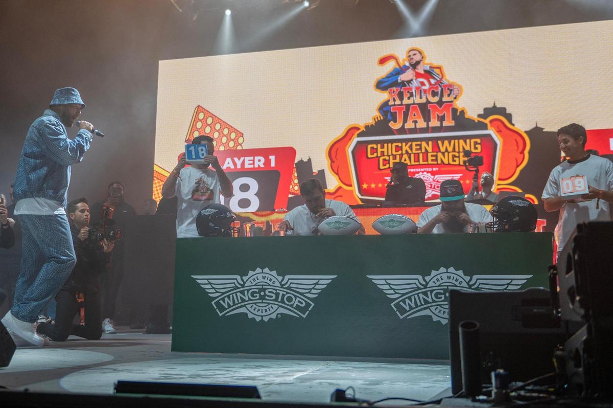 Travis Kelce judges the Wing Stop Chicken Wing Challenge during Kelce Jam at the Azura Ampitheater on Friday, April 28, 2023, in Bonner Springs.