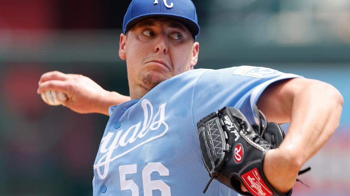 Kansas City Royals pitcher Brad Keller delivers to a Boston Red Sox batter during the first inning of a baseball game in Kansas City, Mo., Sunday, Aug. 7, 2022. (AP Photo/Colin E. Braley)