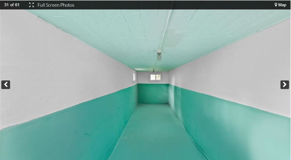 A pool underneath the front porch at 3232 Windsor Ave. This historic home near the Kansas City Museum in the Northeast includes an indoor pool and a ship’s wheel. Screenshot from the Kansas City Regional Association of Realtors website. Feb. 9, 2024.