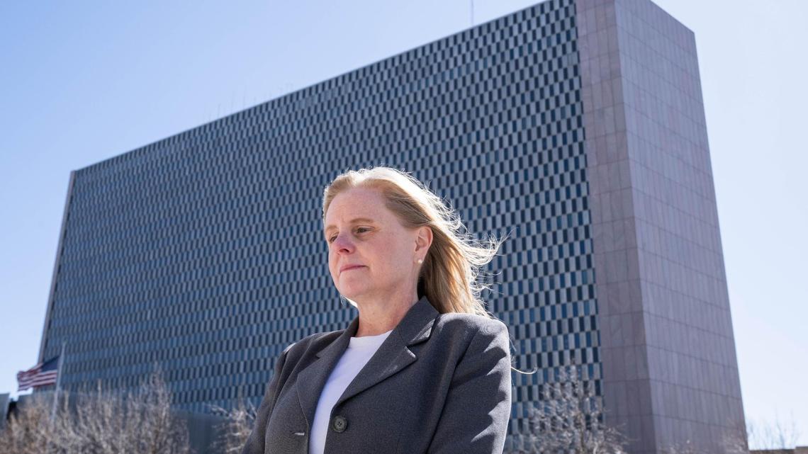 Cynthia Clark outside the Richard Bolling Federal Building in Kansas City on Monday, Mar. 10, 2025. Clark is a Navy veteran and former federal worker who was fired as part of the D.O.G.E. job cuts.