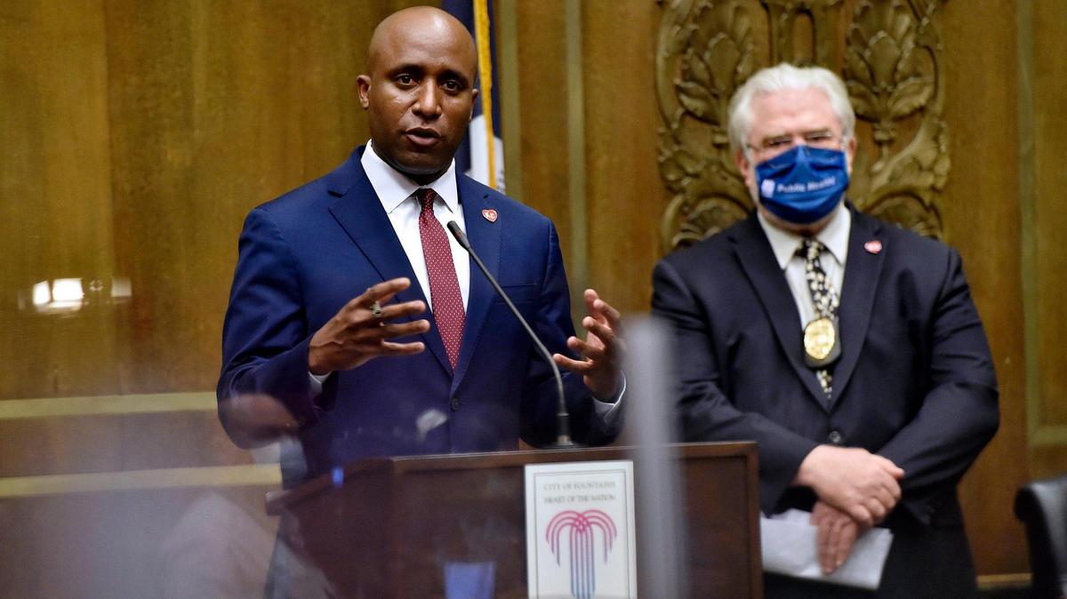 Kansas City Mayor Quinton Lucas, left, will appoint members of a racial equity task force that consist of residents from each council district.