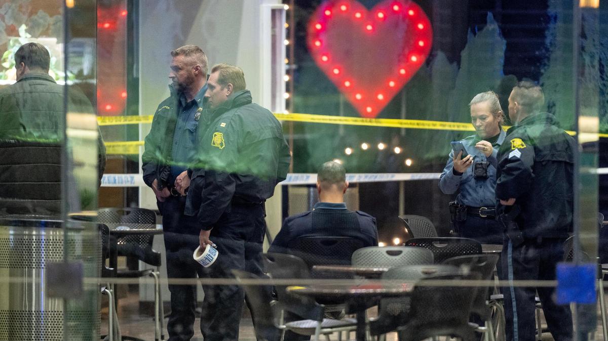 Police work the scene of a shooting on Jan. 17 at Crown Center in Kansas City. Police said six people were injured.
