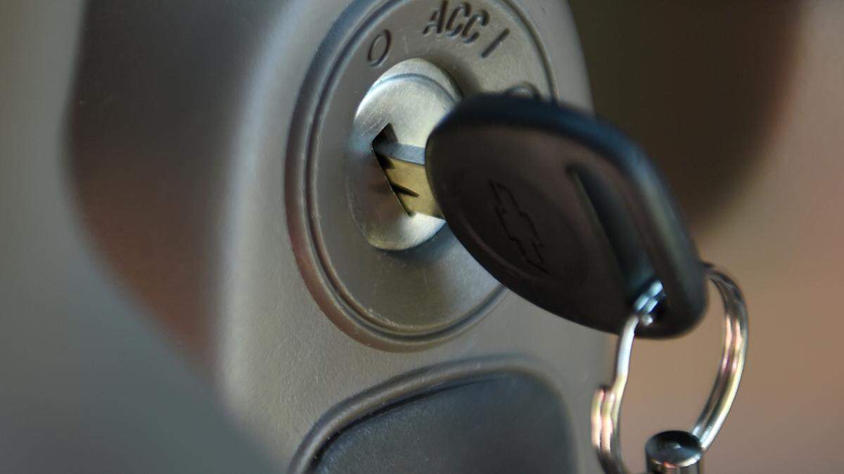 FILE - This Tuesday, April 1, 2014 file photo shows a key in the ignition switch of a 2005 Chevrolet Cobalt in Alexandria, Va. (AP Photo/Molly Riley, File)
