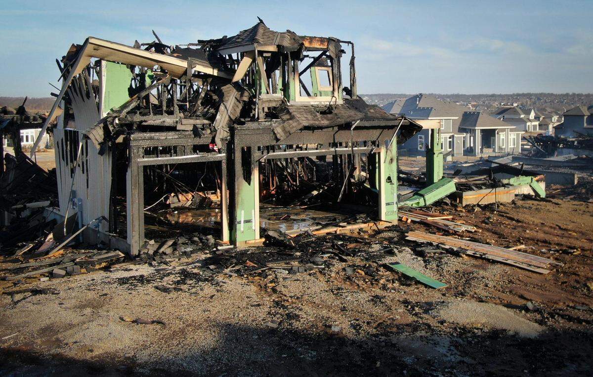 An early-morning fire engulfed three homes under construction Monday, Feb. 28, 2022, in the Stone Creek of Terrybrook Farms subdivision in Overland Park. There were no injuries in the blaze which engulfed the houses in the 11100 block of W. 172nd Terrace.
