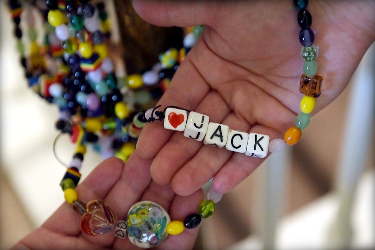 Every time Jack passes a milestone, he gets a glass bead, his mom, Tiffany Palmer, explains. Beads of Courage is a program at the St. Louis hospital where Jack was being cared for. Each bead symbolizes an act of courage every night in the hospital: every needle stick, all his scans of his head or his heart, all his surgeries and blood transfusions.