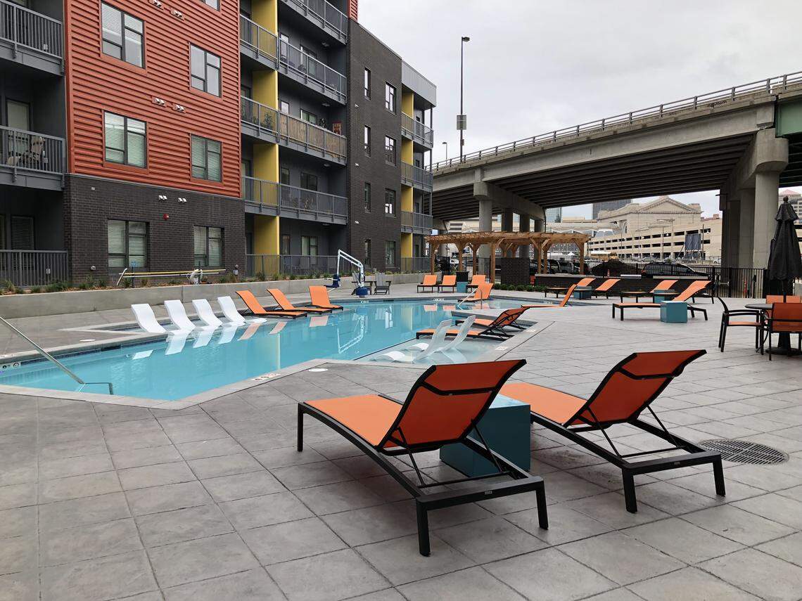 Crossroads Westside Apartments has a saltwater pool with views of Union Station. The deck area also features barbecue grills and fire pits.
