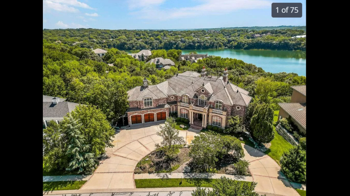 The house at 27596 W. Highland Circle in Olathe features a scenic view of Shadow Lake in the Cedar Creek neighborhood.