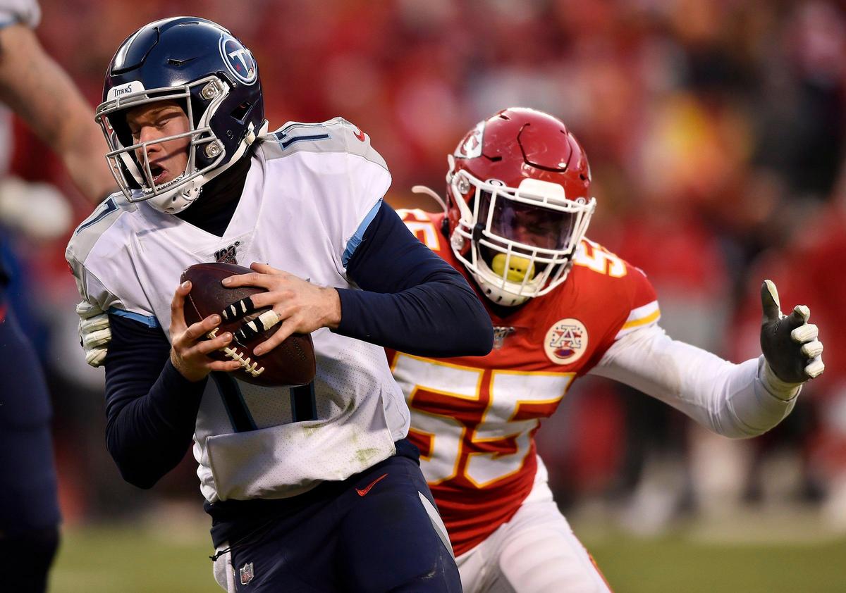 On fourth down, Kansas City Chiefs defensive end Frank Clark (55) sacked Tennessee Titans quarterback Ryan Tannehill (17) for a loss of yards, giving the Chiefs the ball to the Chiefs late in the fourth quarter of the AFC championship game Sunday, January 19, 2020, at Arrowhead Stadium in Kansas City, Missouri. The Chiefs defeated the Titans 35-24.