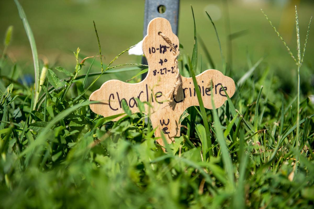 On Tuesday, Aug. 30, 2022, a small wooden cross could be seen next to a sign post as a memorial at the corner of View High Drive and Longview Road bicyclist Charles Criniere who was killed there Saturday by a hit and run driver.