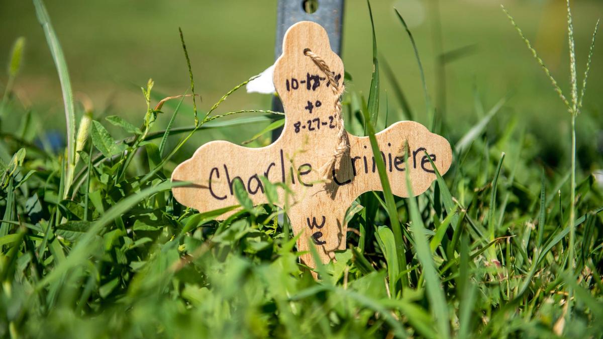 On Tuesday, Aug. 30, 2022, a small wooden cross could be seen next to a sign post as a memorial at the corner of View High Drive and Longview Road bicyclist Charles Criniere who was killed there Saturday by a hit and run driver.