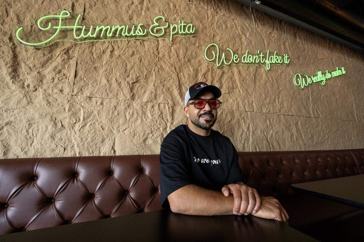 Dhaka Eid, owner of Hummus and Pita, sits for a portrait on Tuesday, Sept. 2, 2025, in Overland Park.