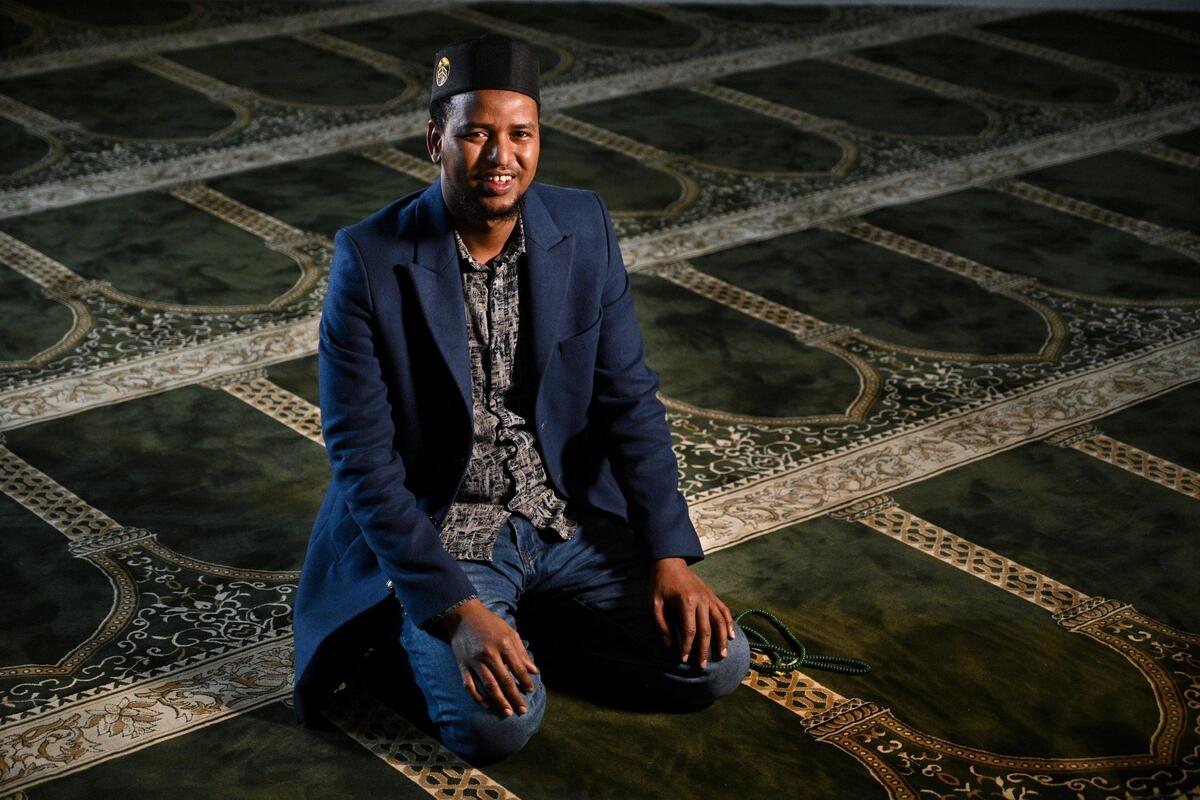 Shafi Mohamed left war-torn Somalia when he was 6 years old and spent 24 years in a refugee camp in Kenya. After struggling to adjust in St. Louis, he moved to Kansas City and was immediately surrounded by Somalis eager to help him resettle. Mohamed, an Uber driver who became a U.S. citizen on April 20, is now helping Afghan refugees by offering them free rides.