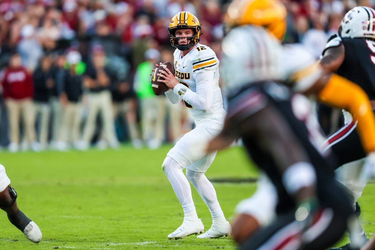 Missouri Tigers quarterback Brady Cook drops back to pass during a Saturday, Nov. 16, 2024 college football game against the South Carolina Gamecocks at Williams-Brice Stadium in Columbia, South Carolina.