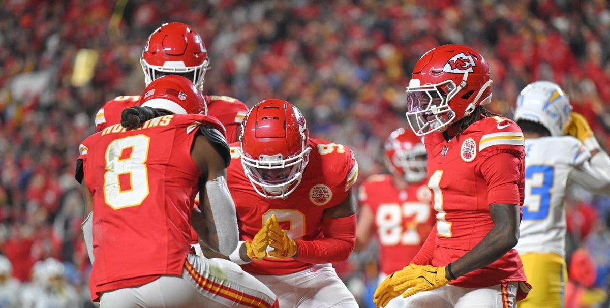 Kansas City Chiefs wide receiver DeAndre Hopkins (8) celebrates with teammates after scoring a touchdown in the second quarter against the Los Angeles Chargers on Sunday, Dec. 8, 2024, at GEHA Field at Arrowhead Stadium.