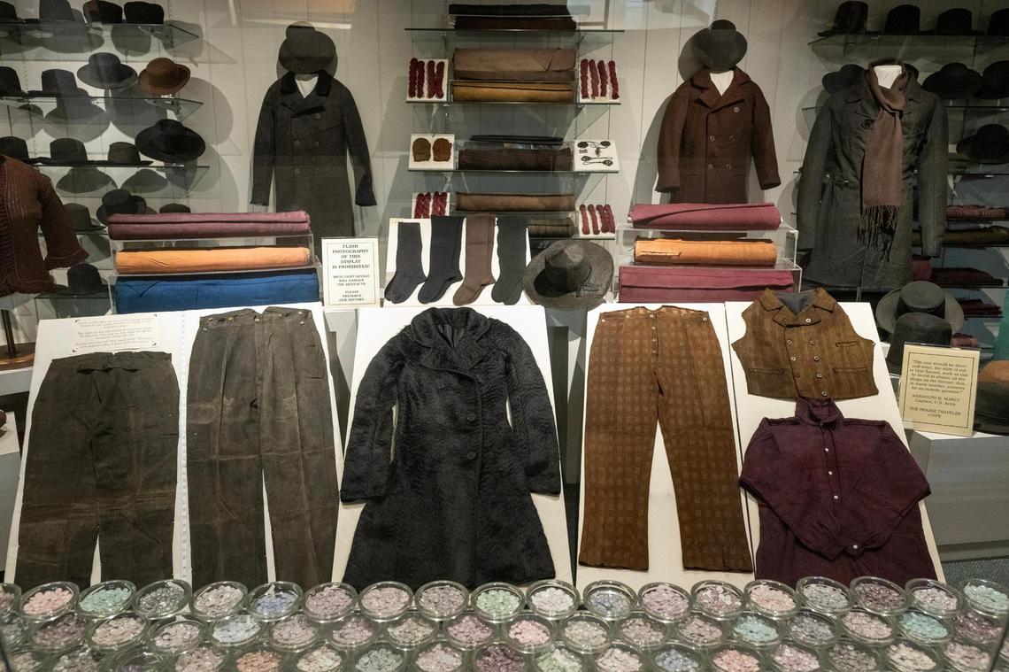 Beautifully preserved garments recovered from the Steamboat Arabia, which sank in 1856, were on display at the Arabia Steamboat Museum in Kansas City on Thursday, April 18, 2025. The display showcases the meticulous cleaning, repair, and re-sewing efforts of the museum’s conservation staff.