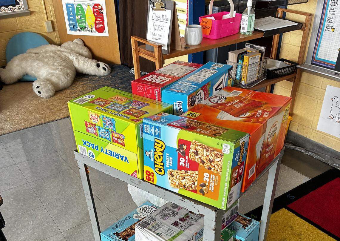 Boxes of snacks on a cart in Carter Taylor’s 2nd grade classroom at Phillis Wheatley Elementary School.