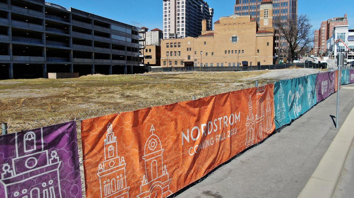 After buildings were demolished, a fenced off area on the west side of the Country Club Plaza awaits construction of a new Nordstrom store.