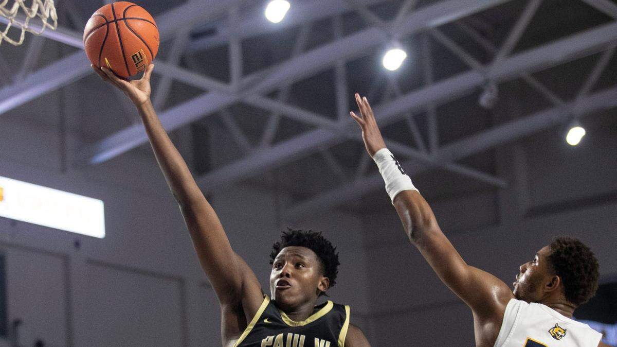 Patrick Ngongba goes up for a shot against Wheeler in the City of Palms Classic third-place game on Wednesday, Dec. 21, 2022, at Suncoast Credit Union Arena in Fort Myers.