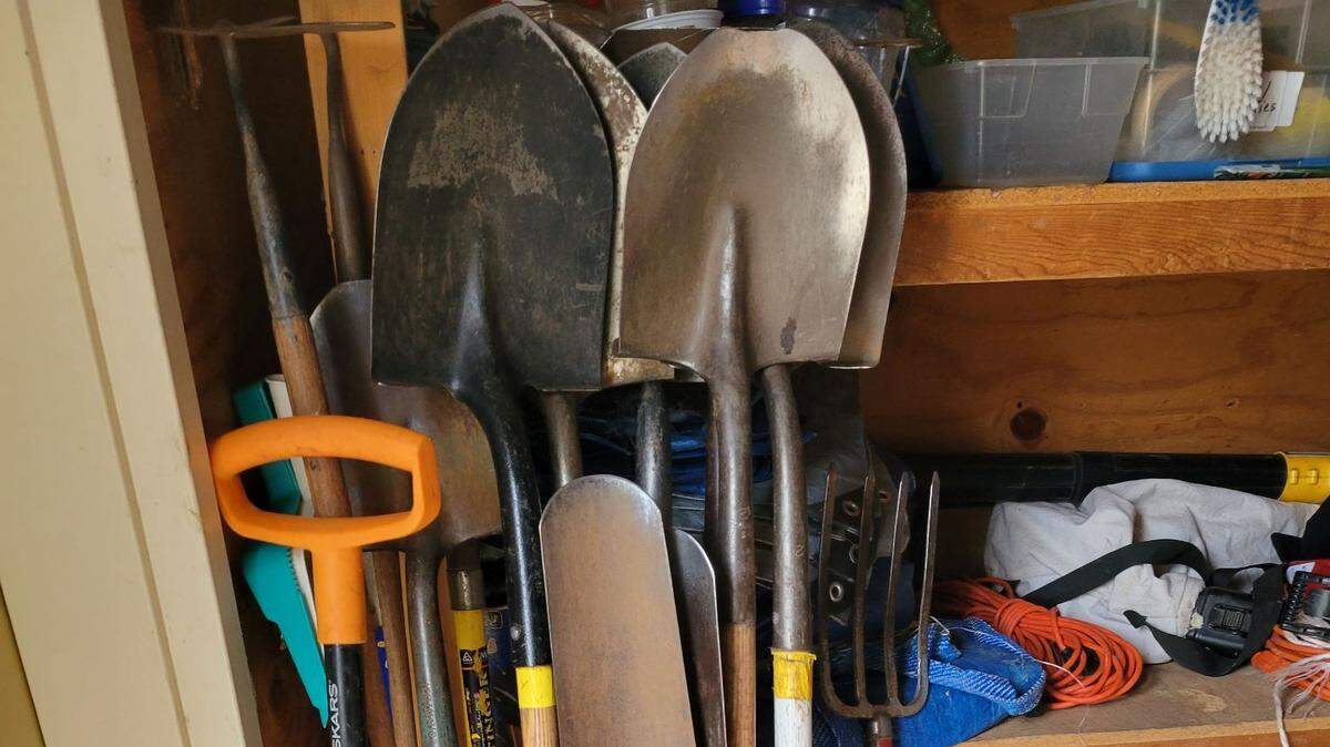 The wooden handles and metal on garden tools need TLC before spring.