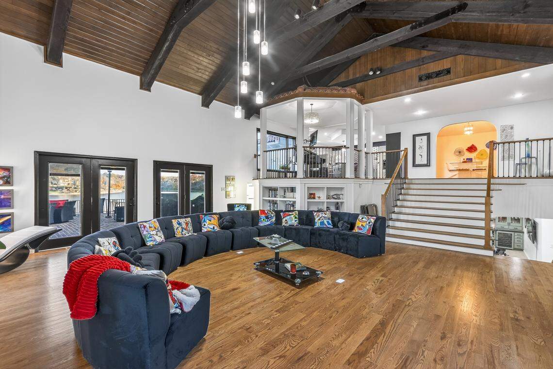 The open concept living room inside 102 NW Hackberry St. in Lee’s Summit offers plenty of space for the owner to host gatherings with family and friends.
