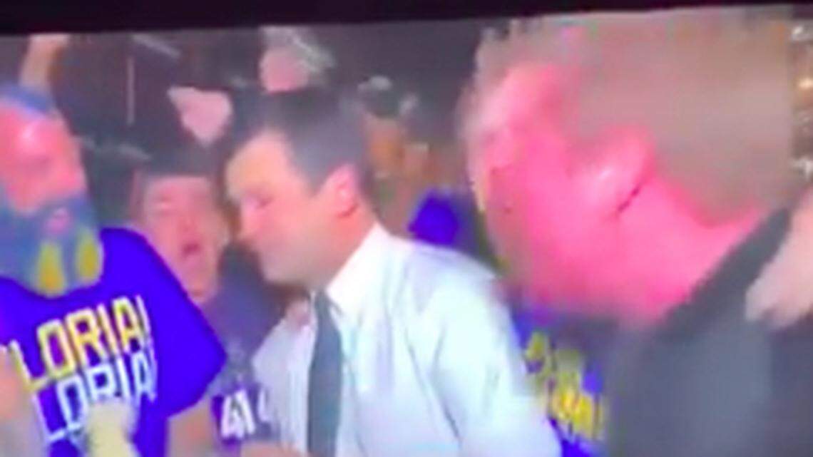 Boisterous Blues fans in KC tried to get a TV reporter to drink a beer on air