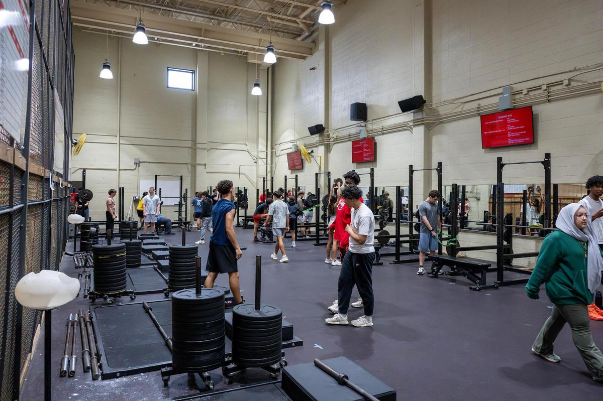 Students are seen in the weight room near the basketball courts at Park Hill High School on Tuesday, March 18, 2025, in Kansas City.