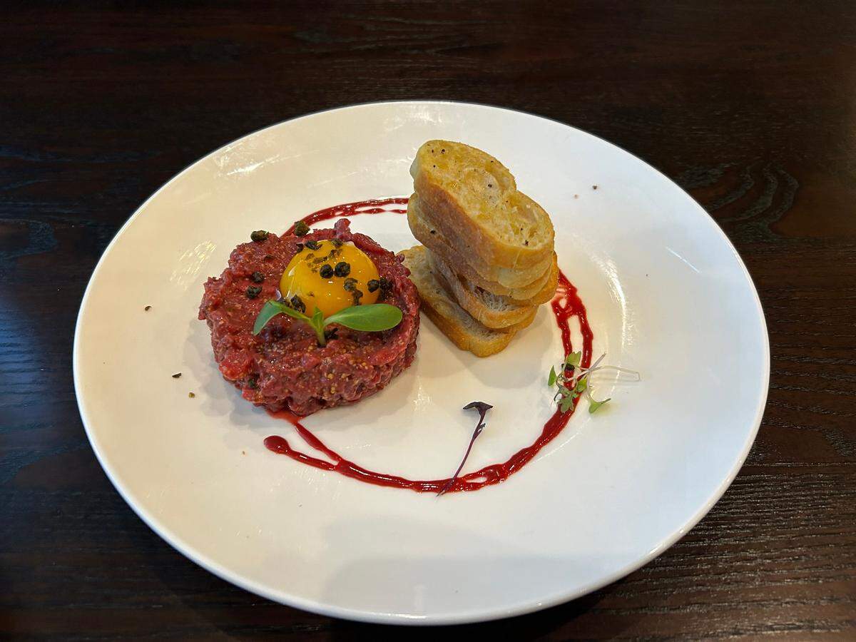 Steak tartare is half-off, $9, during happy hour at Prima Facie.
