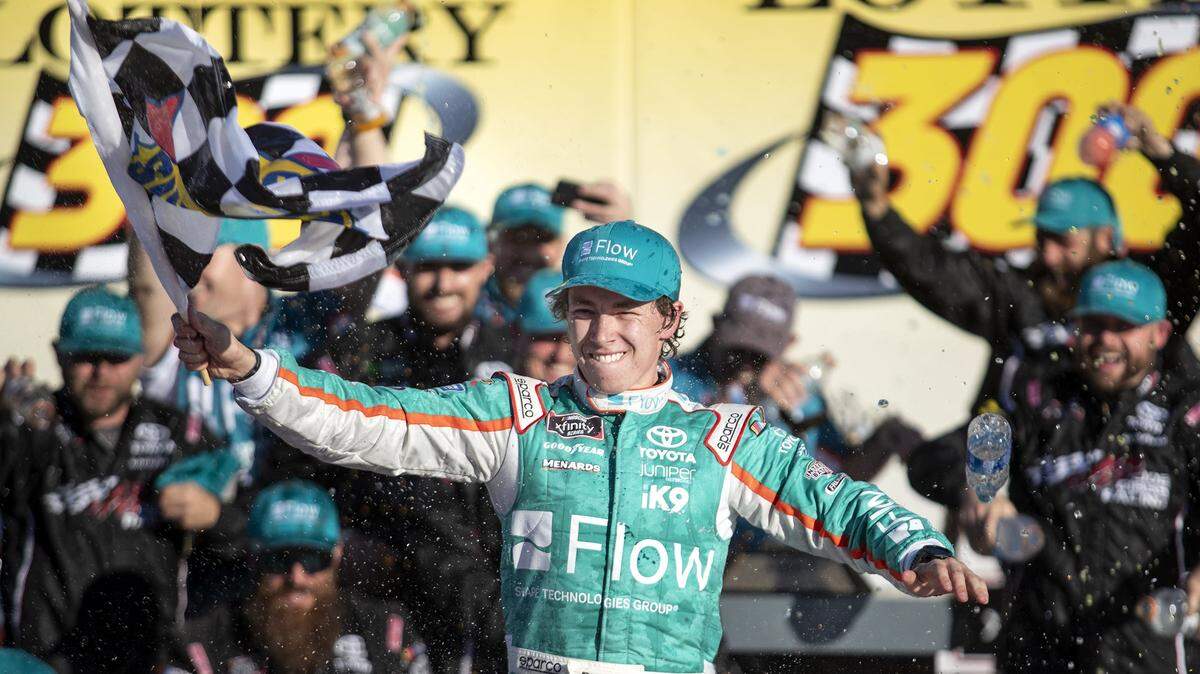 Brandon Jones celebrates after winning the NASCAR XFINITY Series Kansas Lottery 300 Saturday, Oct. 19, 2019, at Kansas Speedway.