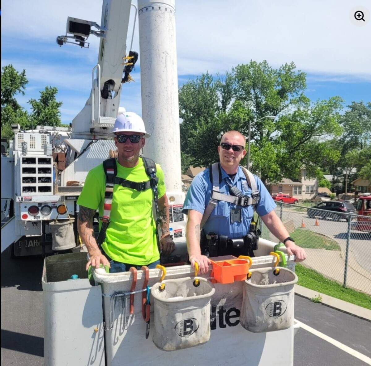 Josh McKee, left, at a Kansas City BPU school event in 2025.