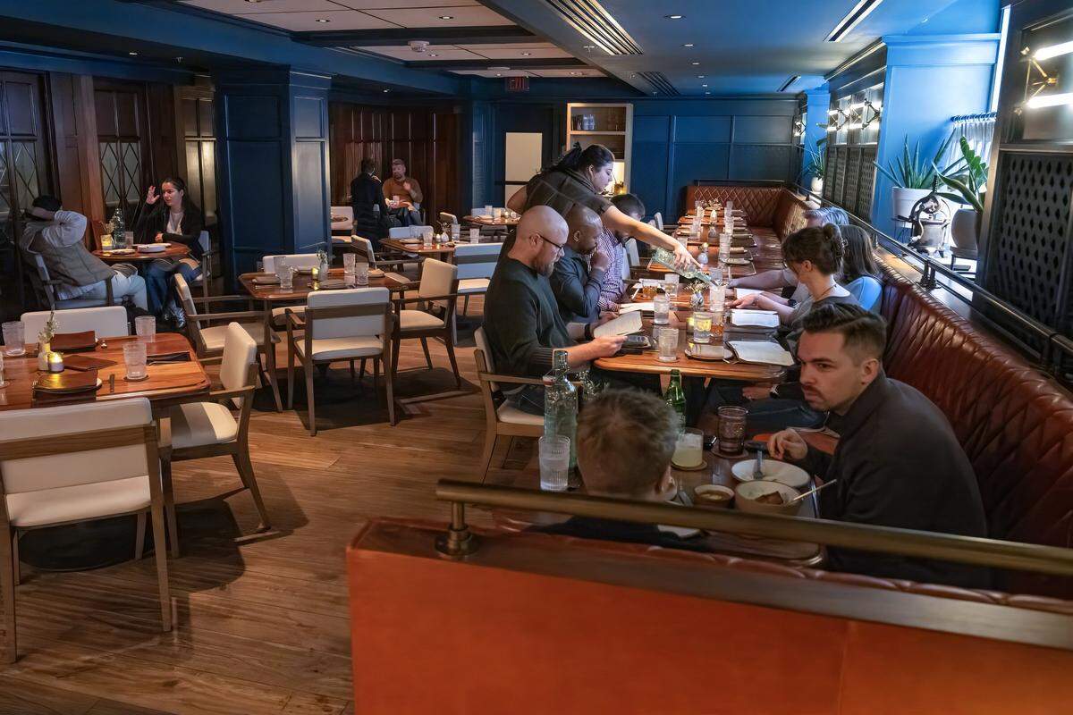 Dinner service at The Town Company restaurant on Wednesday, March 18, 2026, in Kansas City. The restaurant is located inside Hotel Kansas City. 