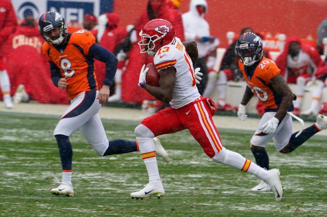 Kansas City Chiefs return man Byron Pringle, the K-State product, runs a kickoff back for a 102-yard touchdown as Denver Broncos kicker Brandon McManus, left, and cornerback Duke Dawson give chase Sunday.