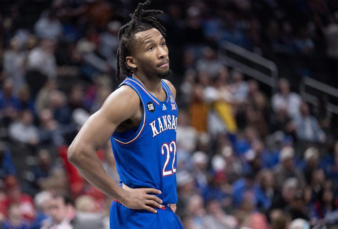 Kansas Jayhawks guard Darryn Peterson (22) takes in the scene as the Jayhawks head to a 69-47 Big 12 tournament semifinal loss to the Houston Cougars at T-Mobile Center in Kansas City on Friday, March 13, 2026.