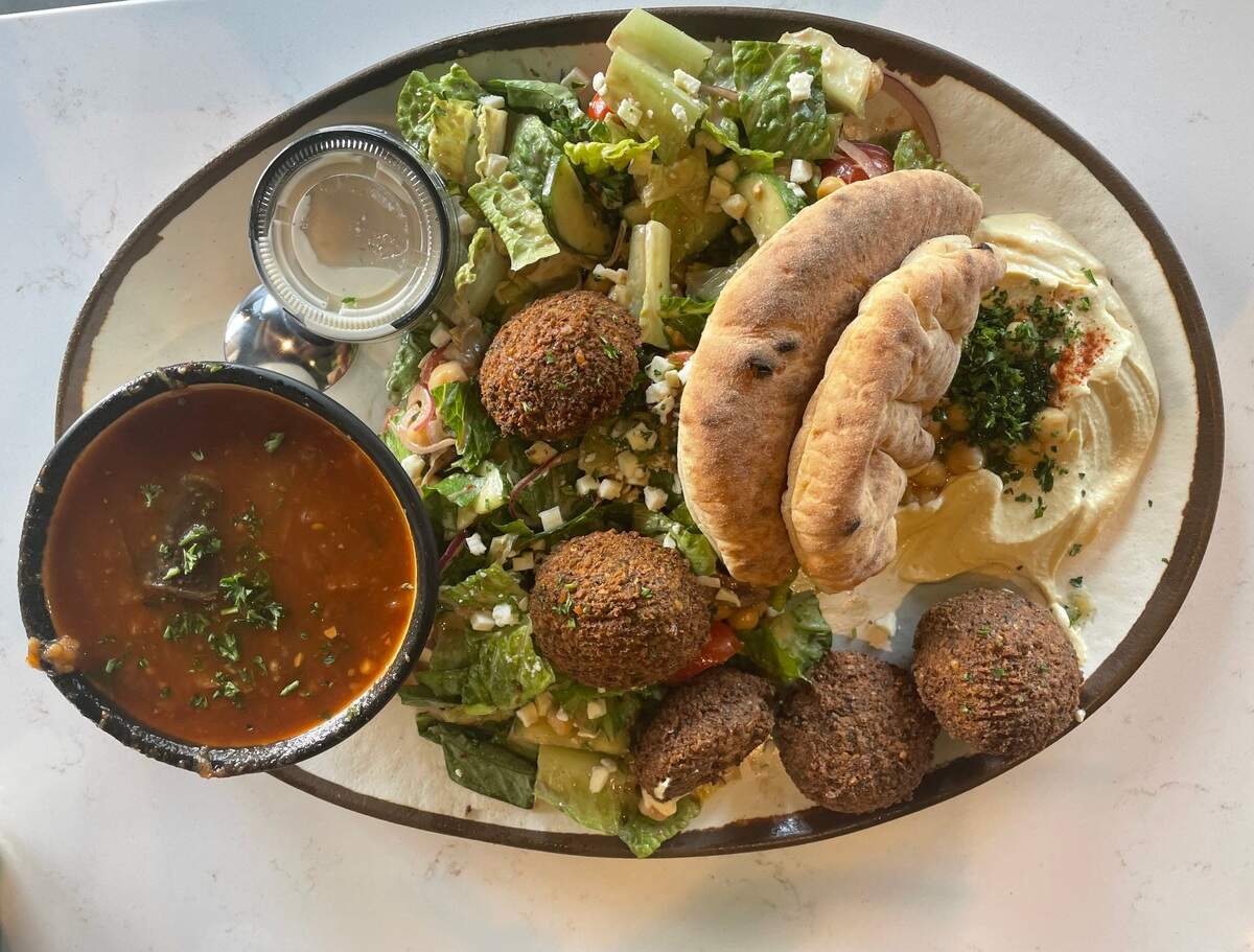The Fancy Falafels plate at Meddys: five falafel patties served with salad, hummus, pita and soup.