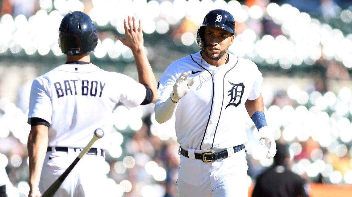 Detroit Tigers right fielder Victor Reyes (22) celebrates his solo home run against the Minnesota Twins with the bat boy in the eighth inning at Comerica Park.