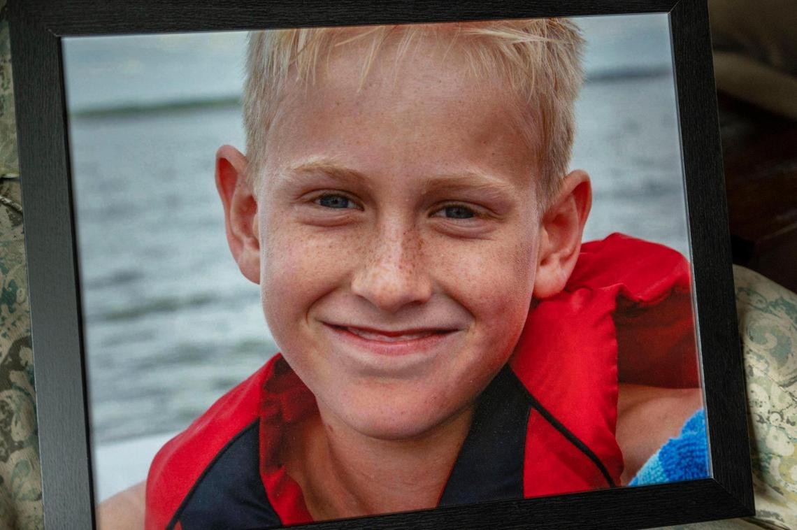 A family photo of Cooper Davis at age 12 at a lake. Cooper loved the water, his mother said.