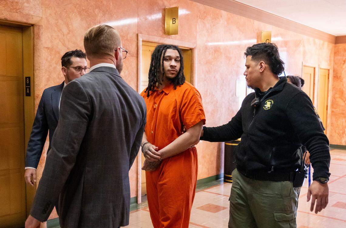 Dominic Miller is escorted to the courtroom, at Jackson County Courthouse, on Monday, March 9, 2026, in Kansas City. Miller is accused of fatally shooting Lopez-Galvan during the 2024 Chiefs Super Bowl rally mass shooting.
